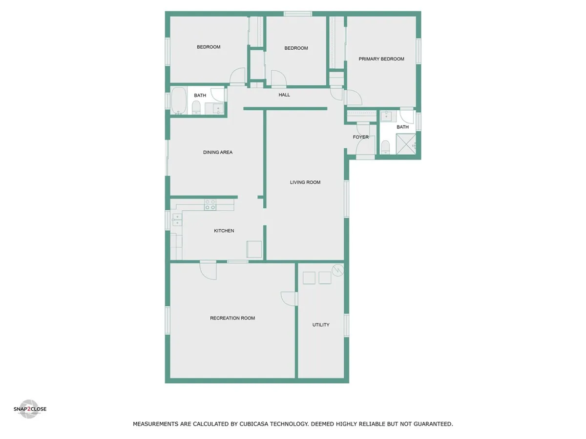 A wide view encompassing the kitchen, living room, primary bedroom, dining area, and foyer, styled for gatherings and relaxation. The space is open and inviting with plenty of natural light, making it ideal for group activities and casual meetings after a day of work or exploration.